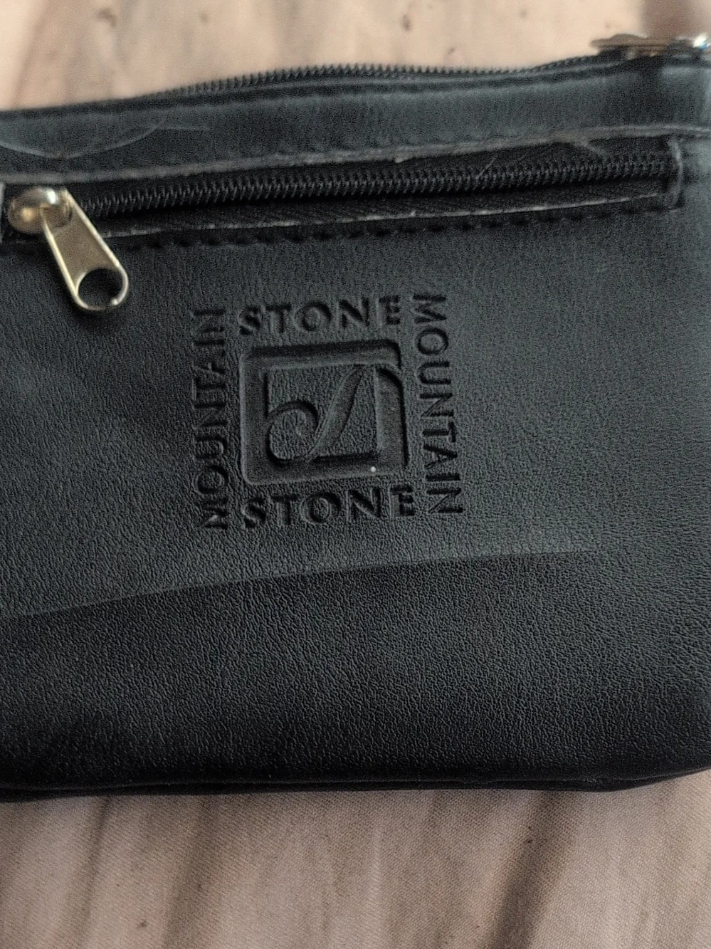 Stone Mountain Accessories Black Leather Men's Zip Pouch with Embossed Logo